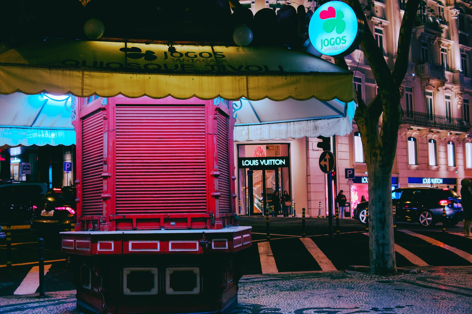a red and yellow building on a city street